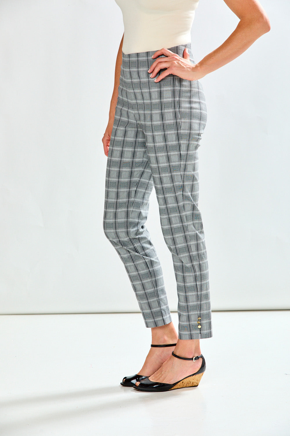 Woman wearing plaid pants 