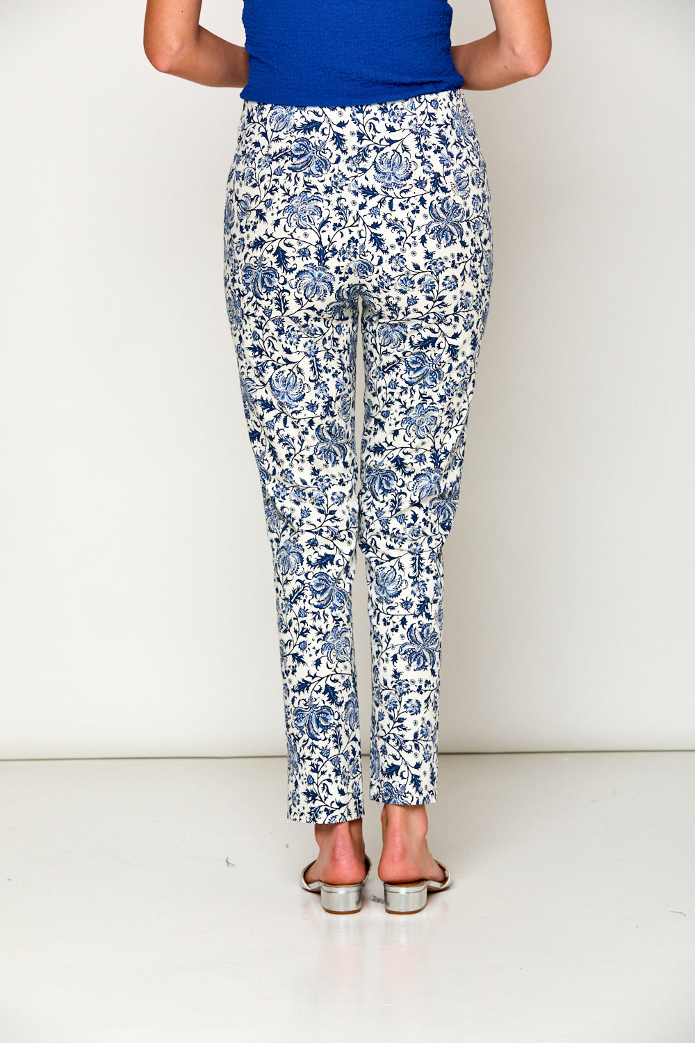 Woman in floral pants