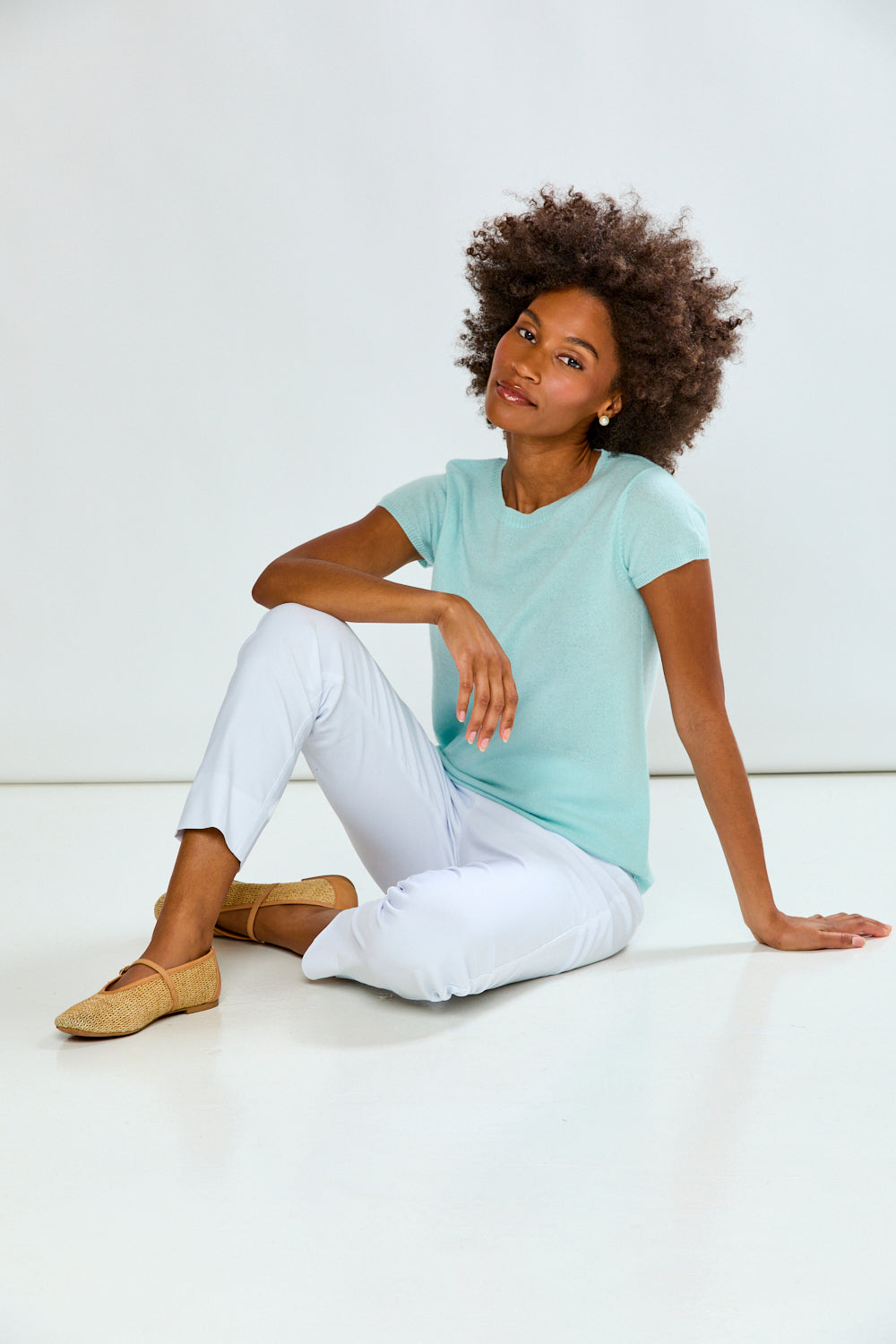 woman in sea glass t-shirt