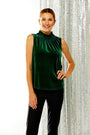 Woman in jade velvet top