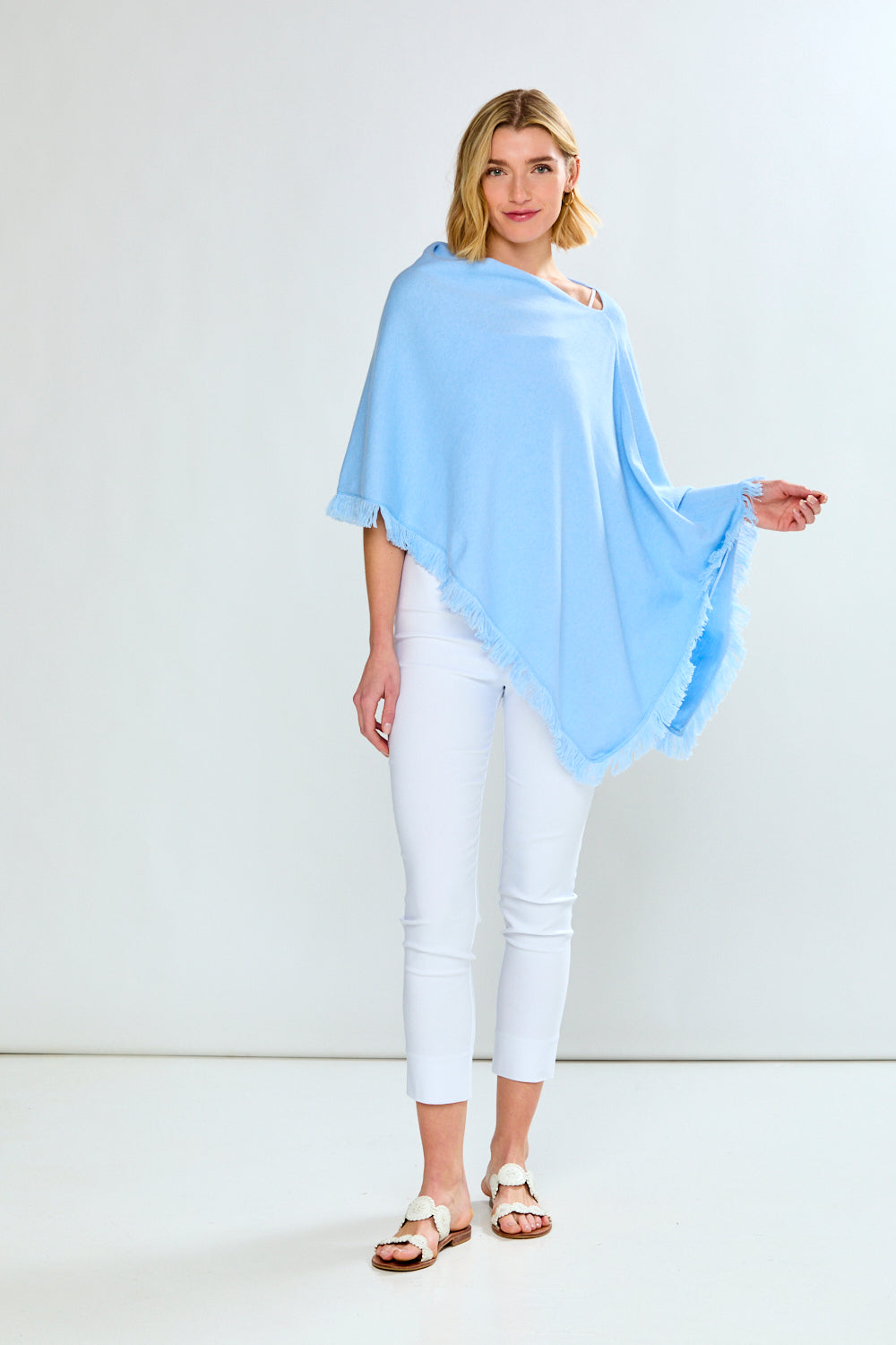 Woman wearing The Fringe Ruana - Powder Blue