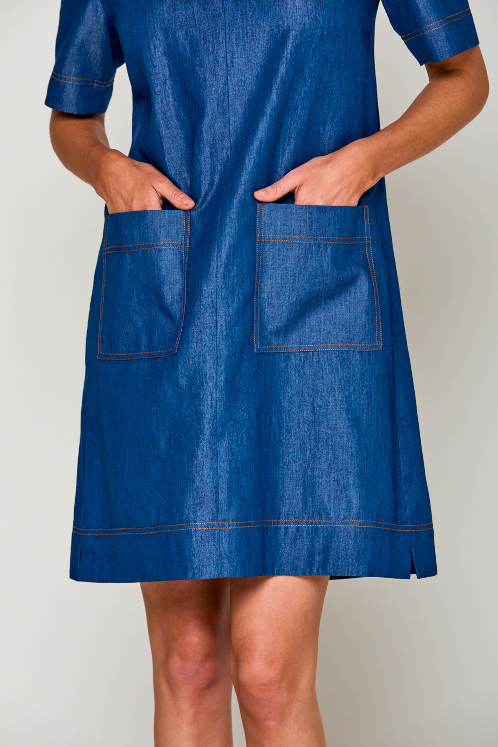 Woman in denim tencel dress