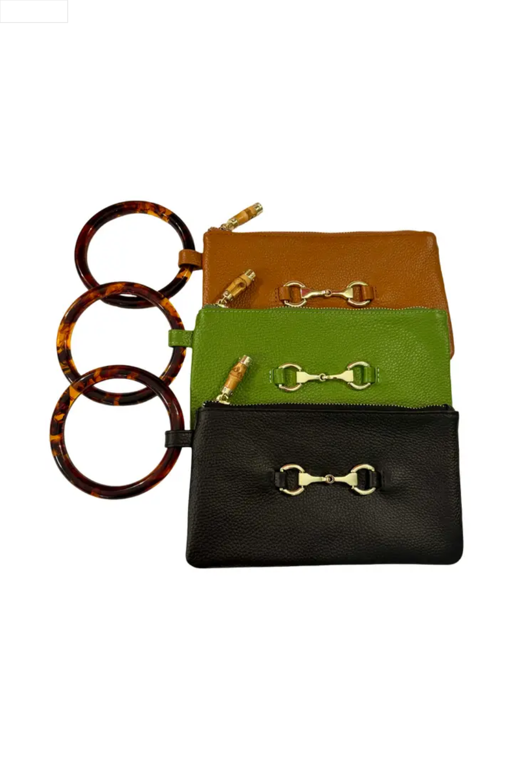 Set of three leather bags in black, green, and brown with gold hardware on a white background.