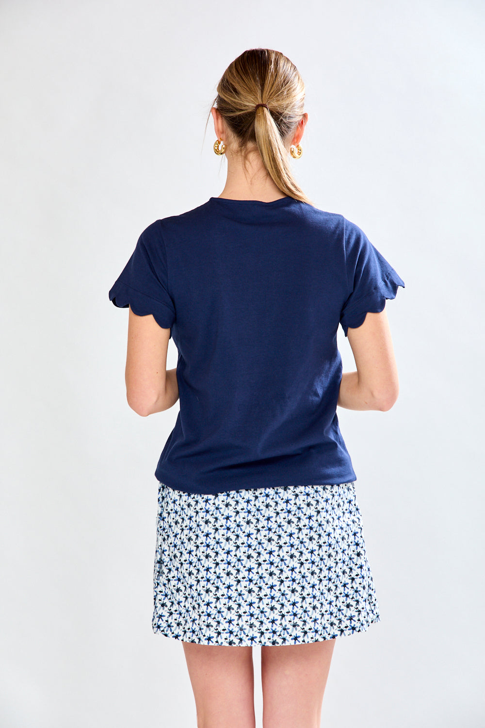 Woman in blue printed skort