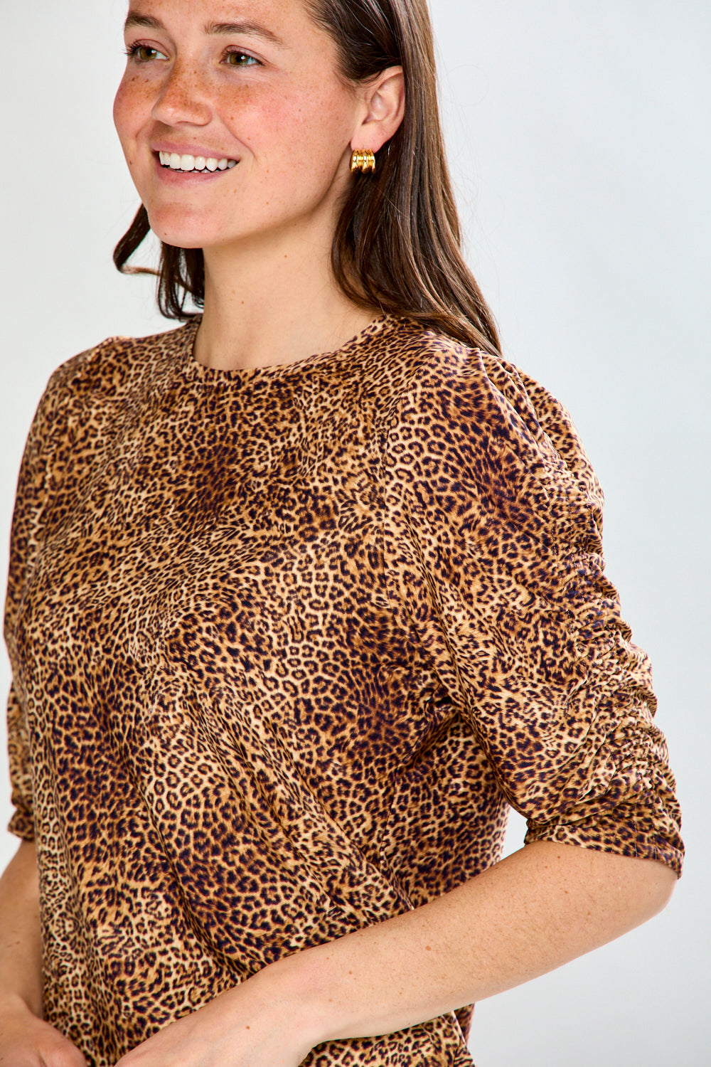 Woman in leopard print top