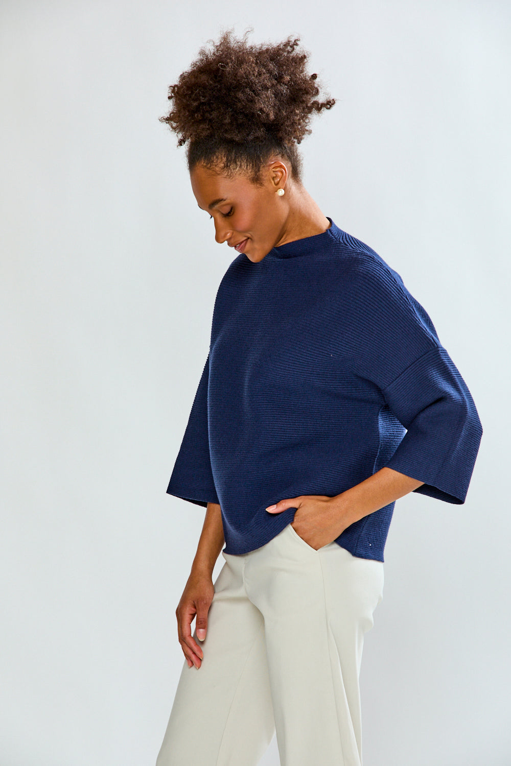 Girl is blue sweater