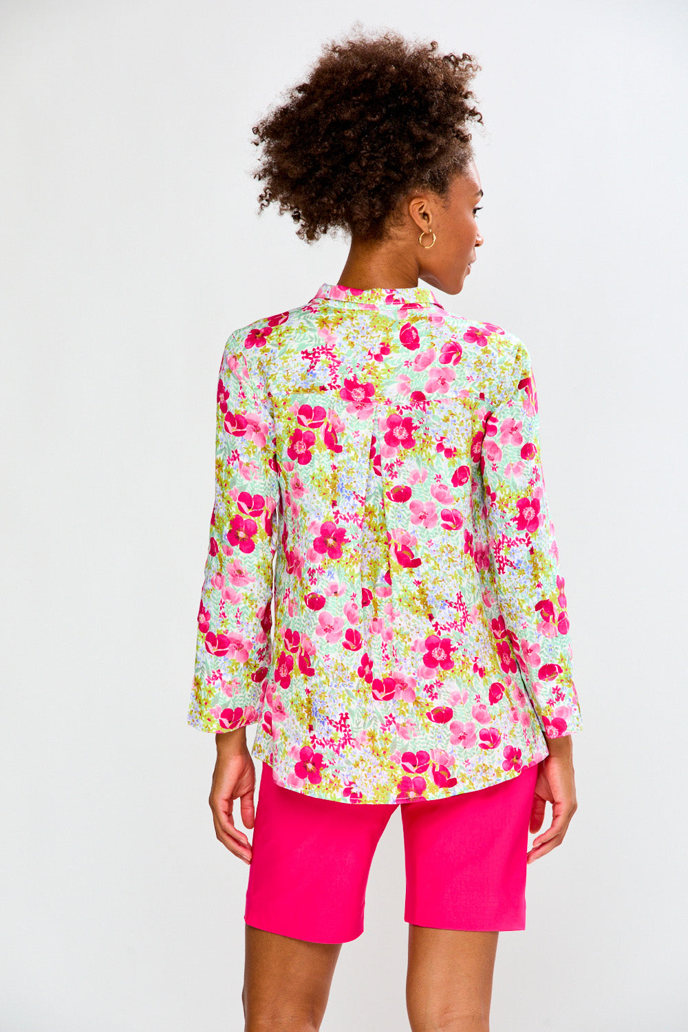 Woman in floral tunic