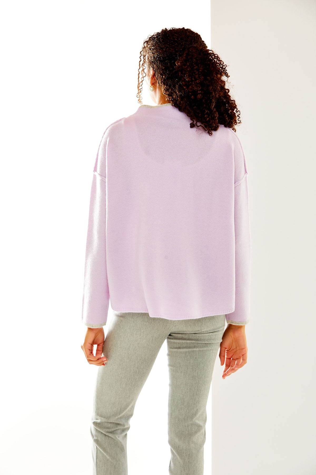Woman in lavender sweater