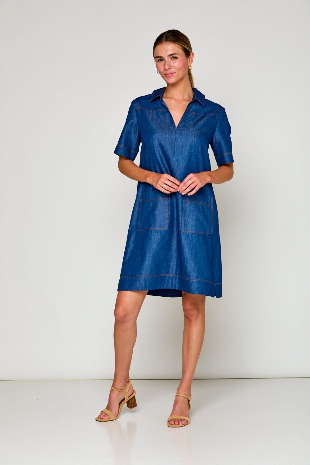 Woman in denim tencel dress