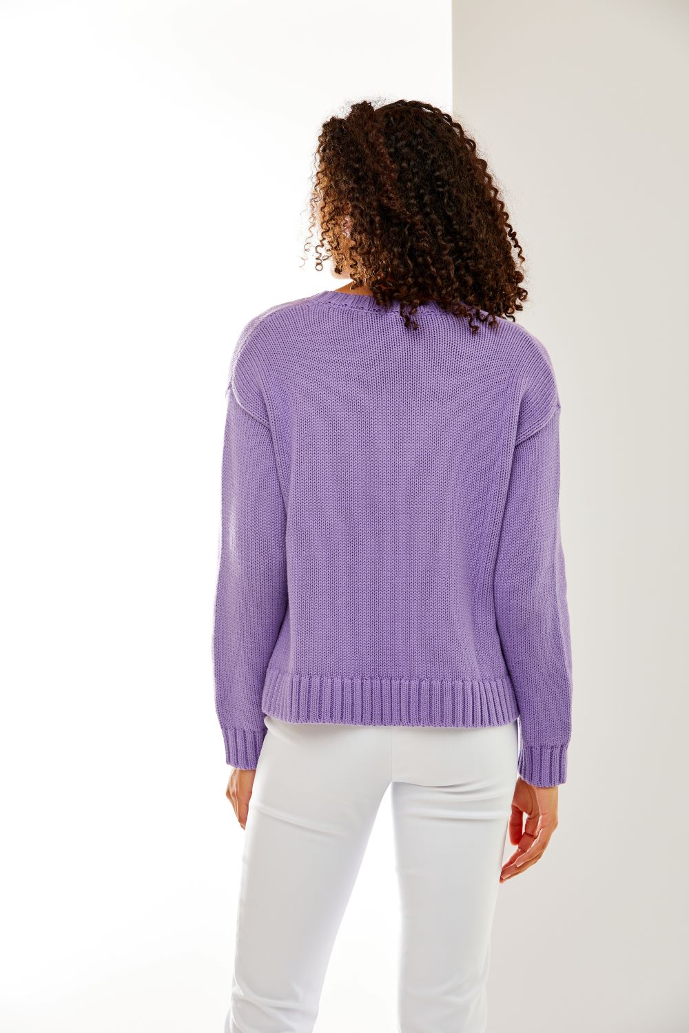 Woman in purple sweater