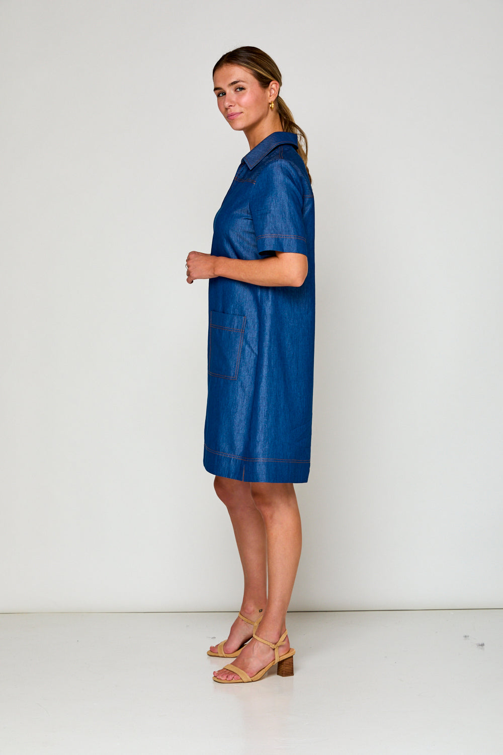 Woman in denim tencel dress