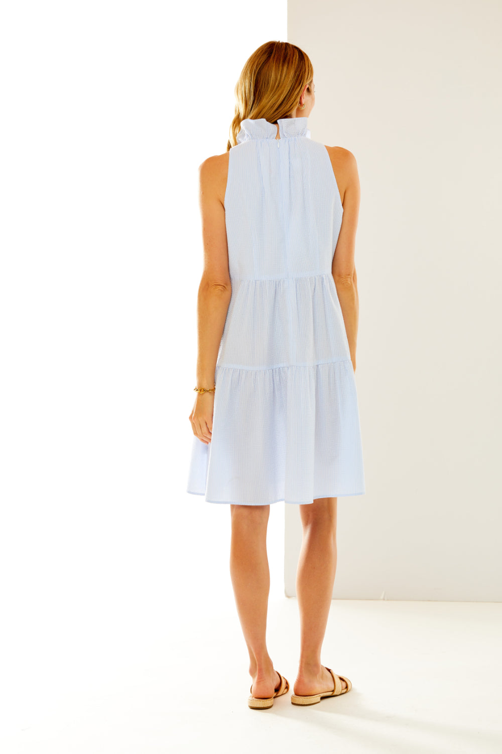 Woman in blue/white striped Lina dress