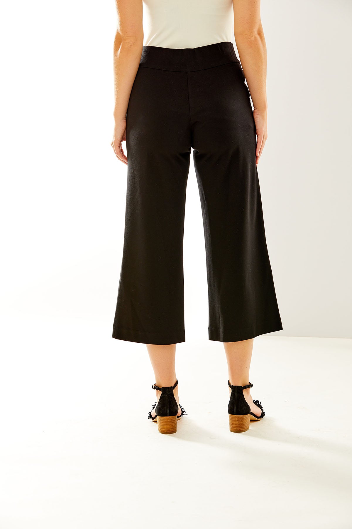 Woman in black cropped pants