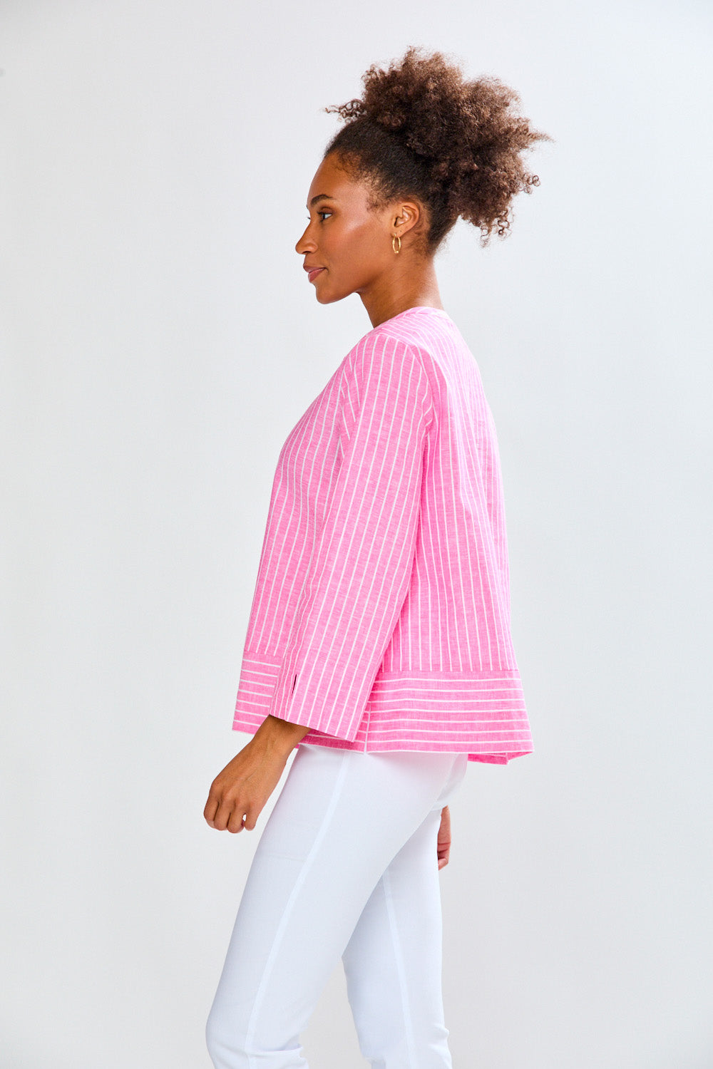 Woman in pink striped tunic