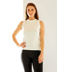 Woman in white sleeveless top