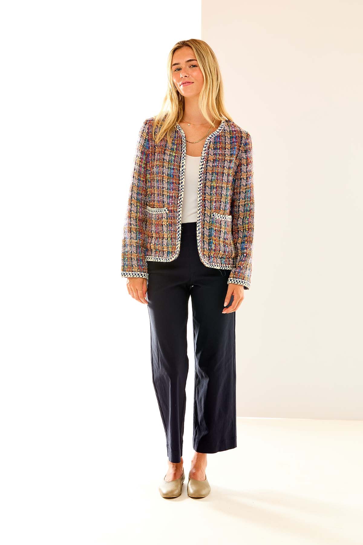 Woman in multi tweed jacket