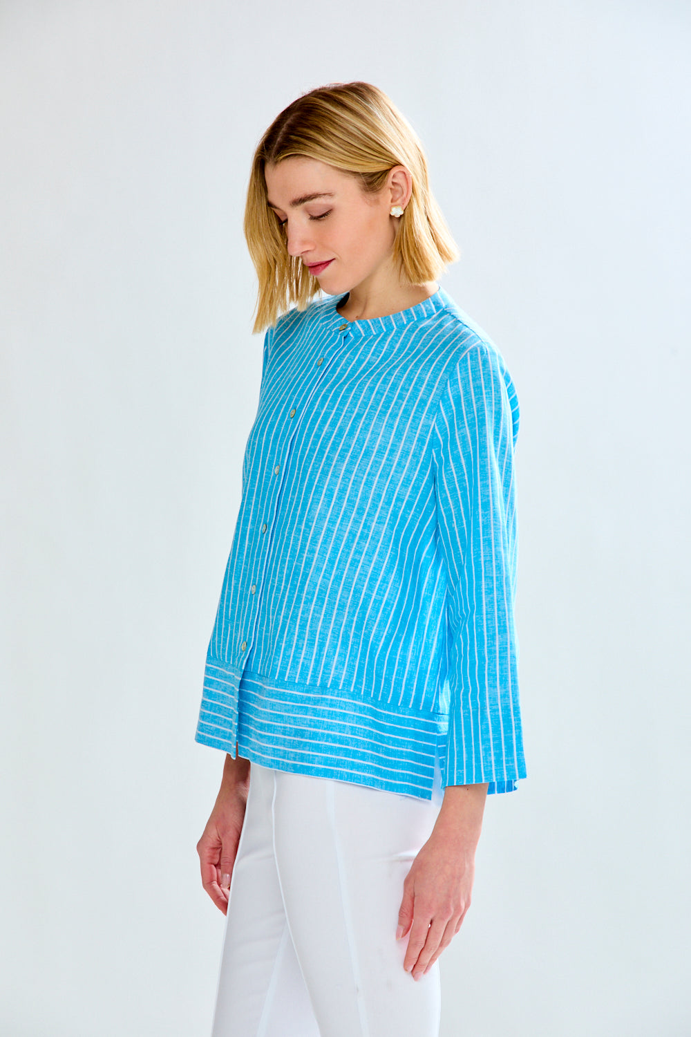 Woman in blue striped tunic
