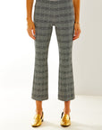 Woman in black/white houndstooth pant