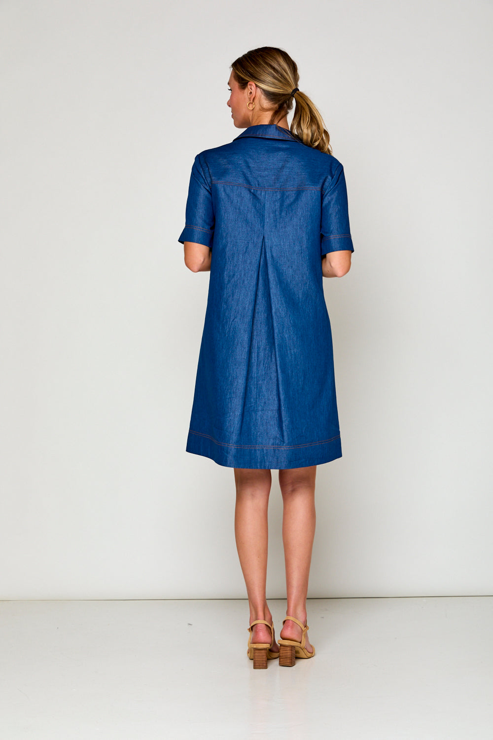 Woman in denim tencel dress