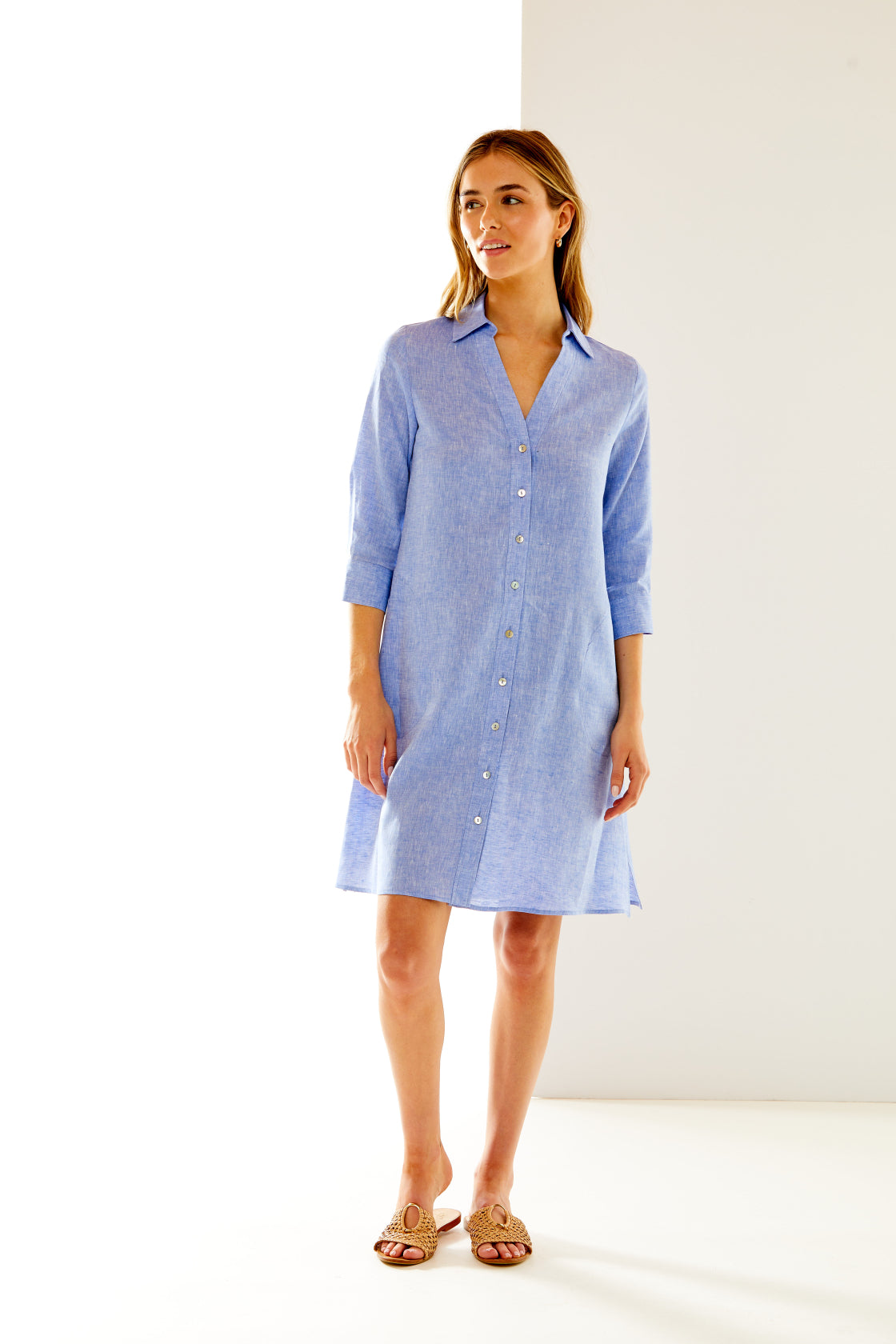 Woman in marine blue linen dress