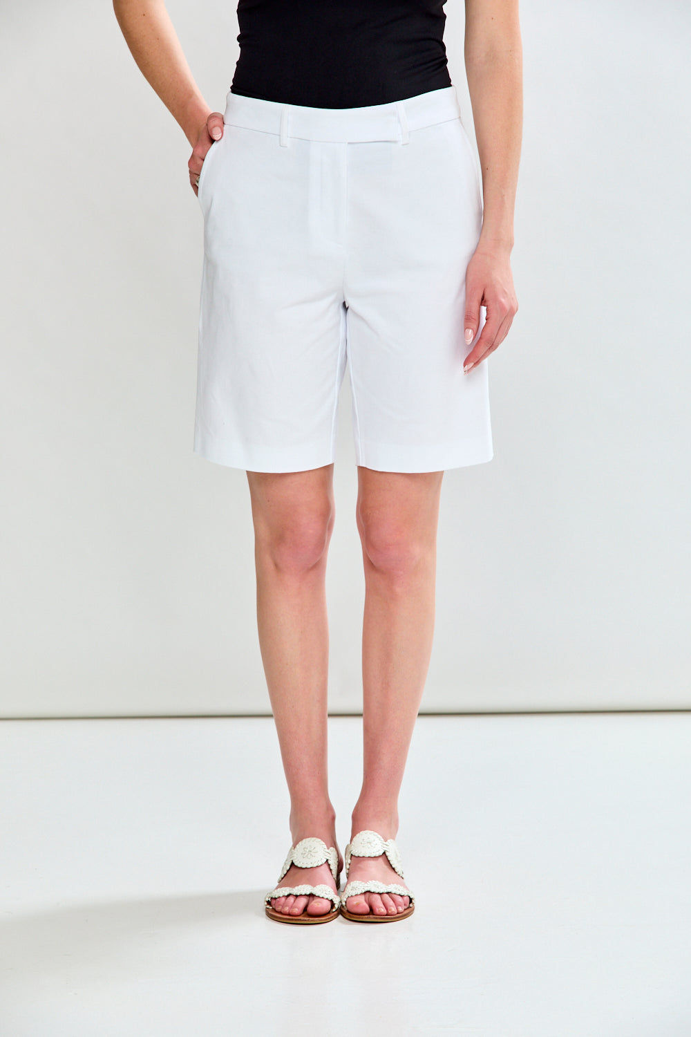 Woman in white bermuda short