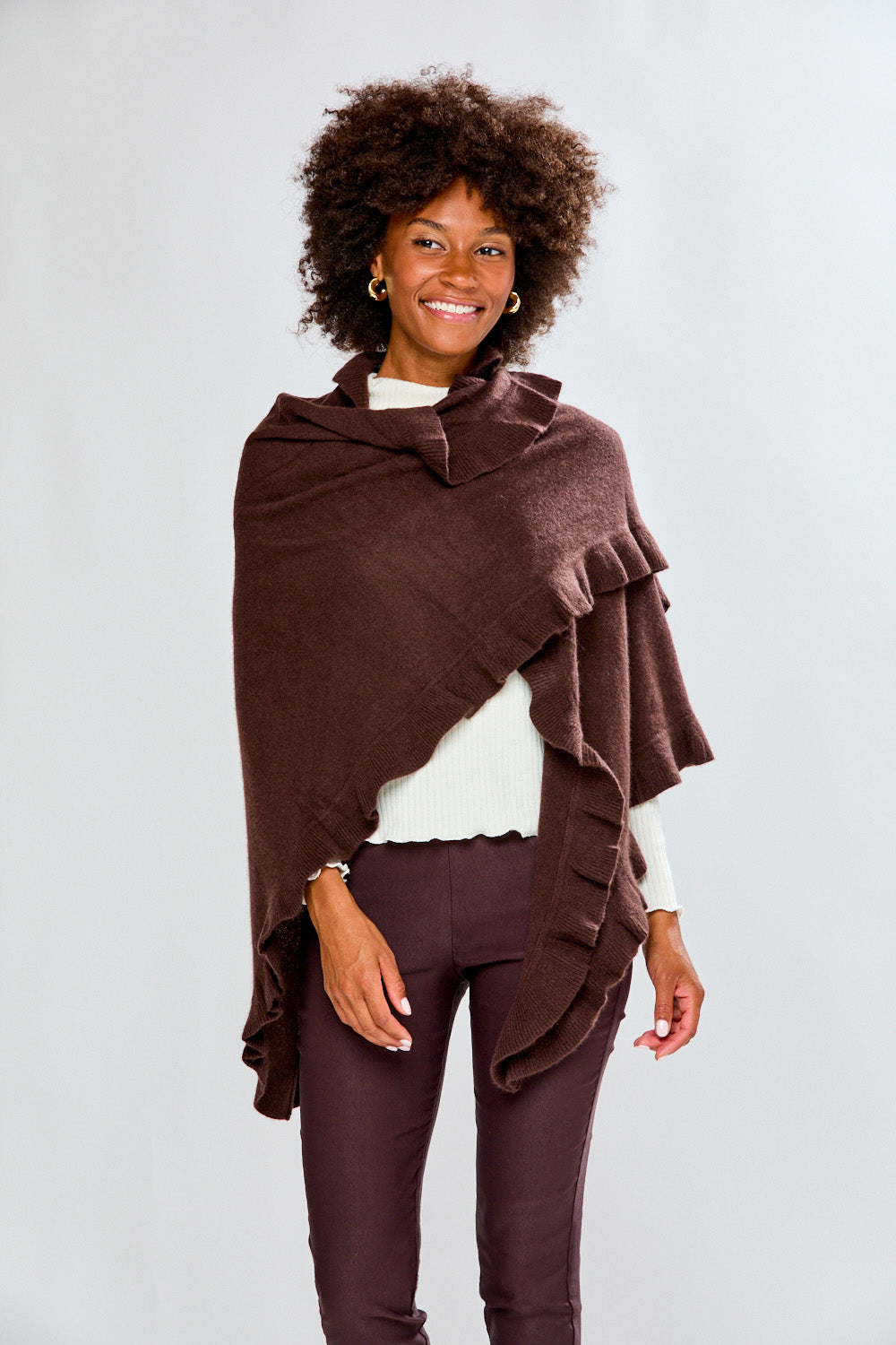 Woman wearing a espresso ruffle cashmere wrap
