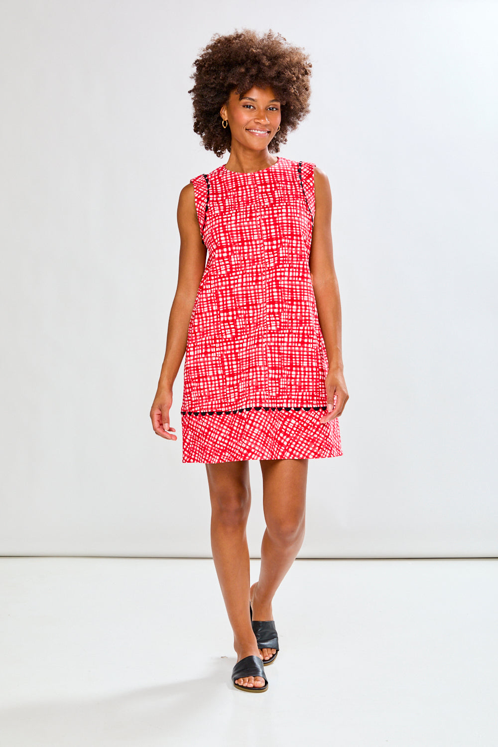 Woman in red patterned dress