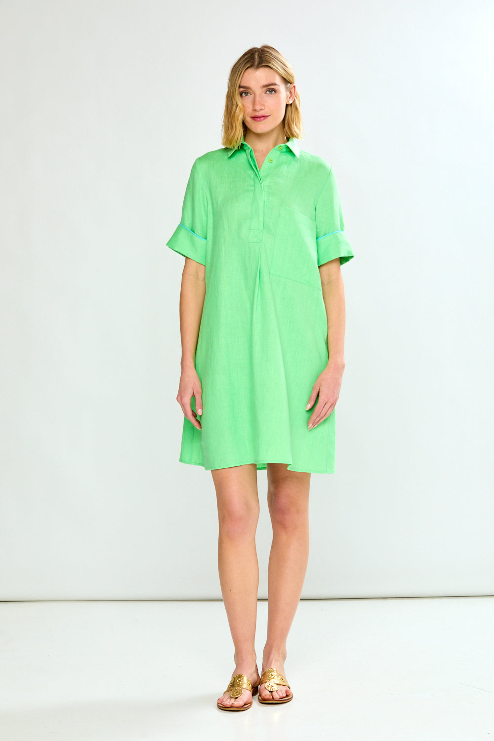 Woman in green linen dress