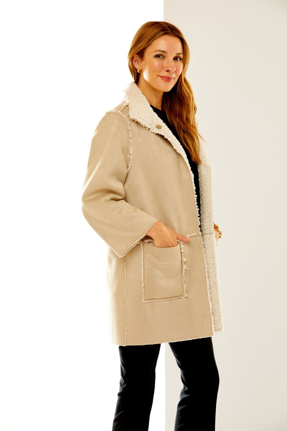 Woman in suede and shearling coat