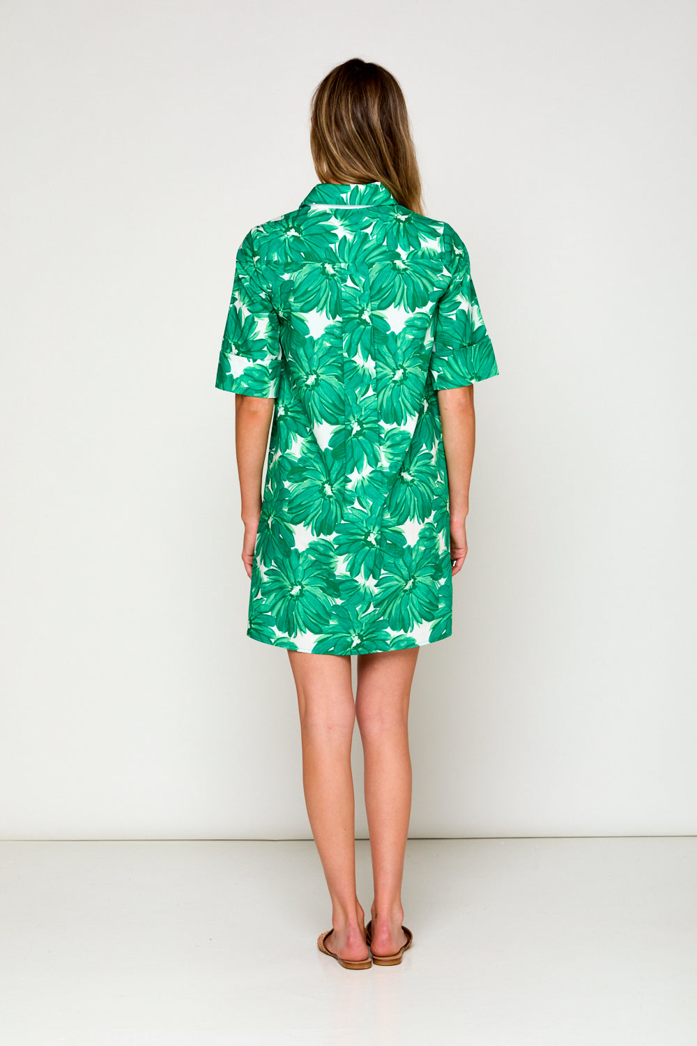 Woman in garden print dress