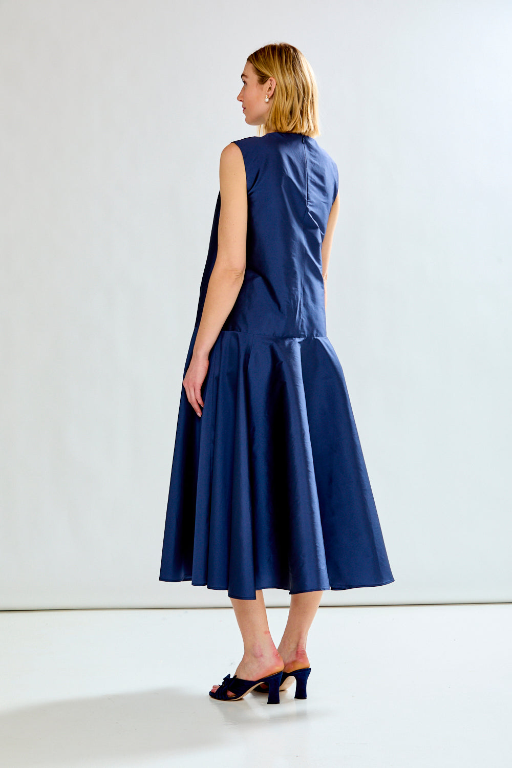 woman in navy dress