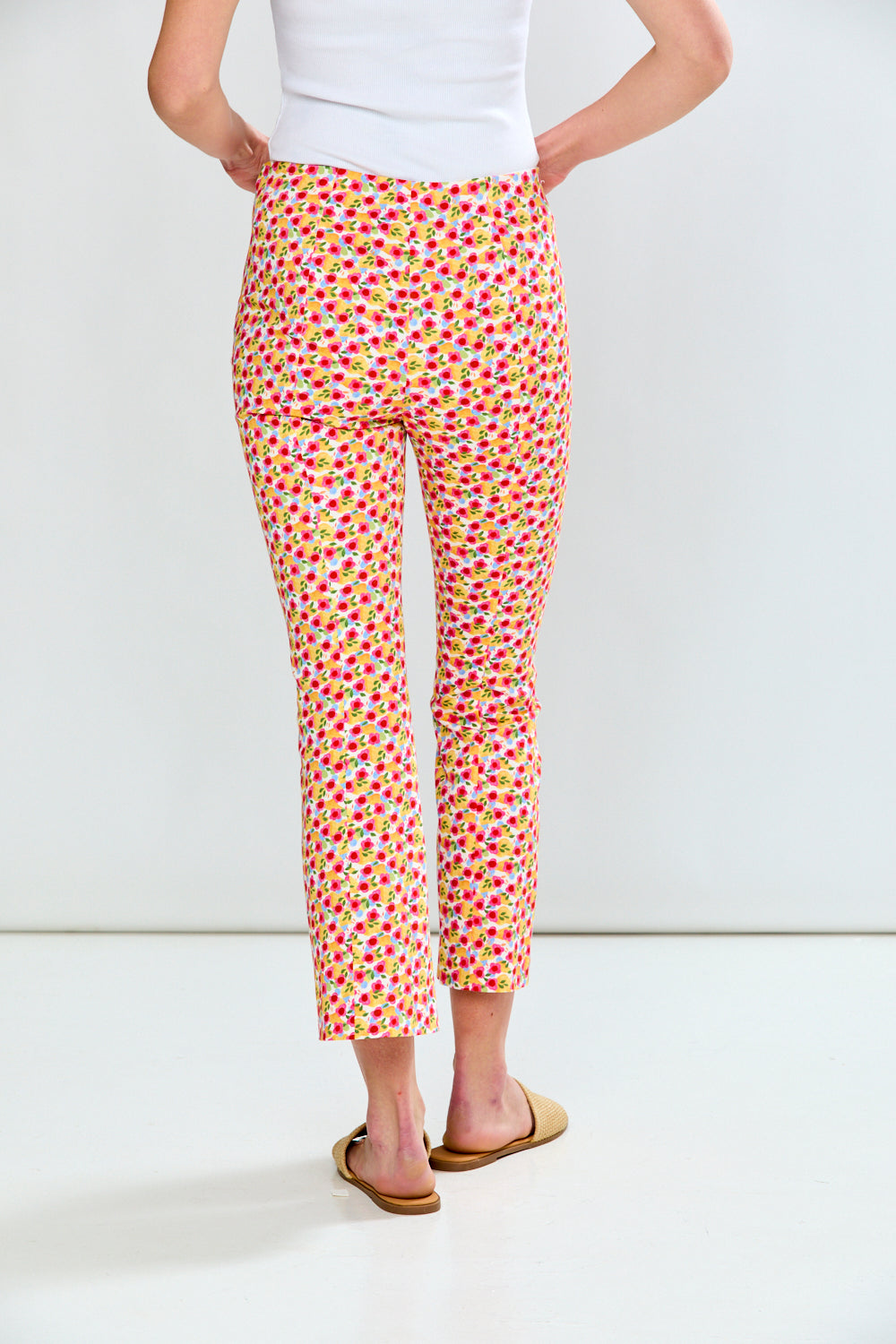 woman in floral pants