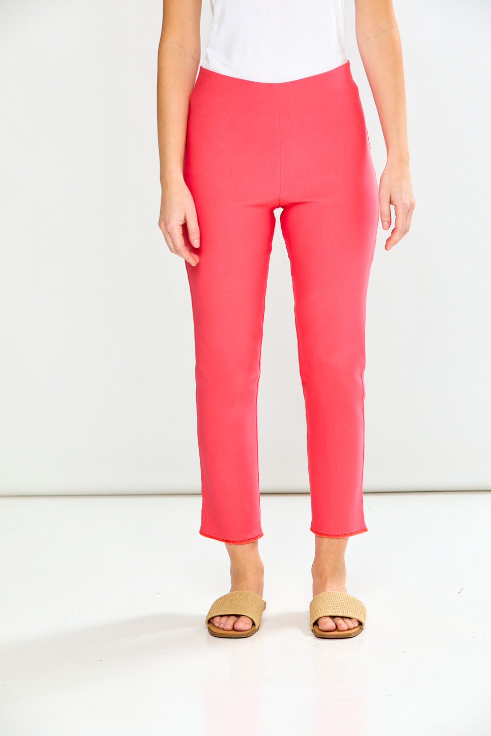 Person wearing Guava pants on a white background