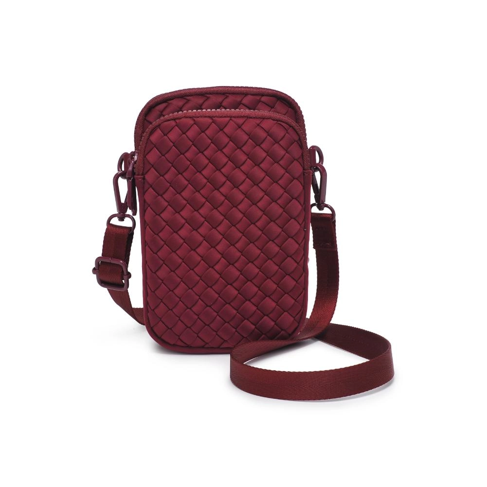 Red quilted crossbody bag on a white background