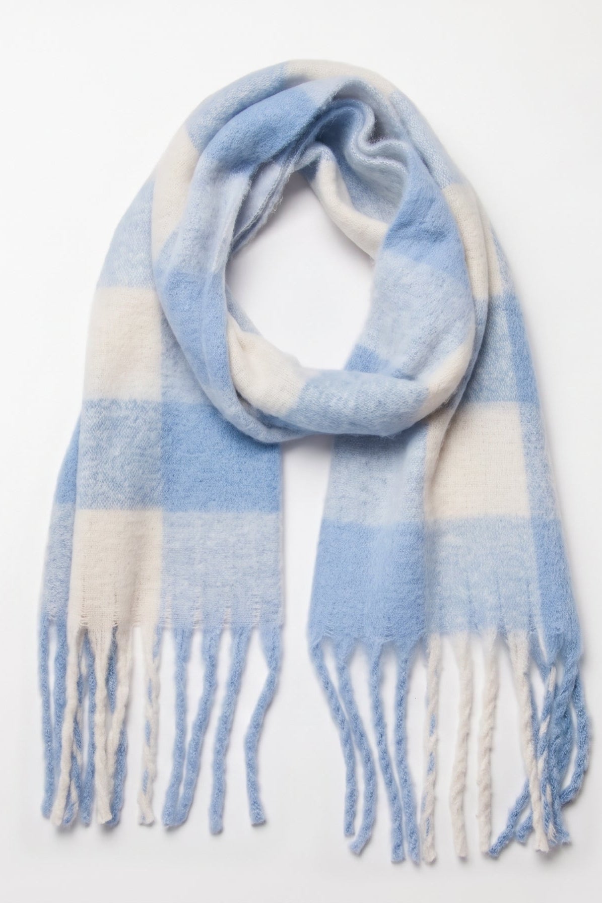 A soft woven scarf with a light blue and cream plaid pattern and fringed ends, arranged in a loop on a plain white background.