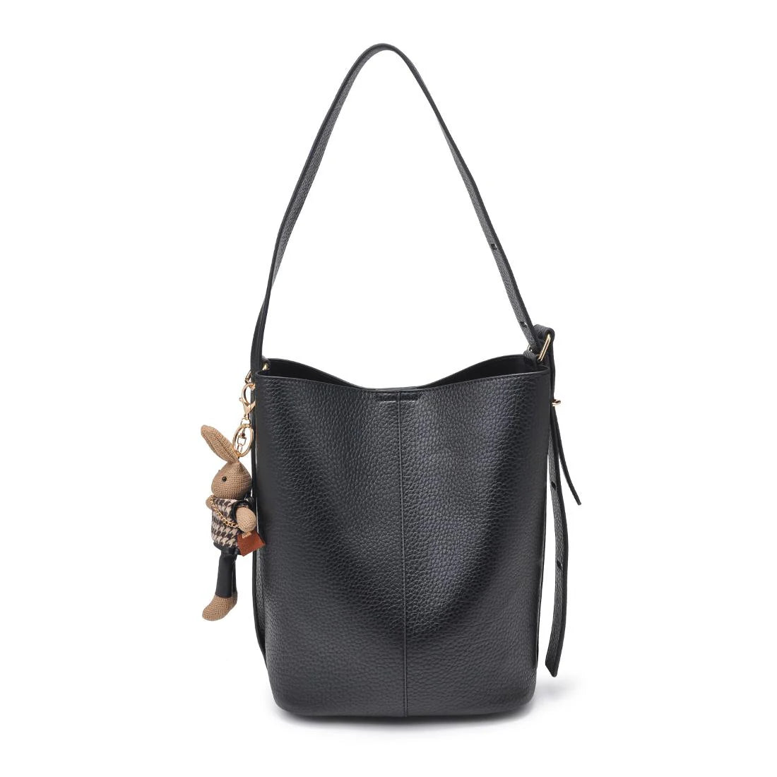 Black leather handbag with a rabbit charm on a white background