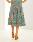 Woman in floral midi skirt