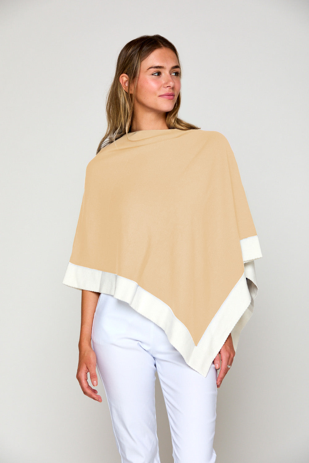 Woman in tipped poncho