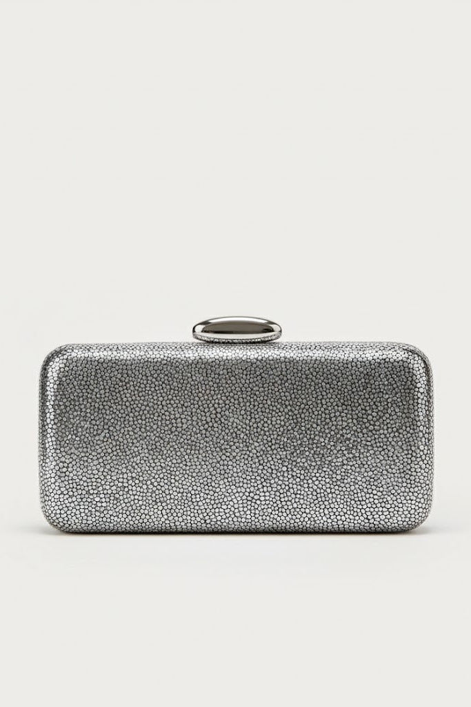 Silver clutch bag on a light gray background