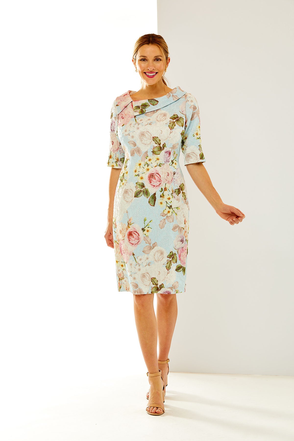 Woman in a floral sheath dress