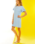 Woman in sky blue shift dress