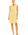 Woman in yellow gingham dress