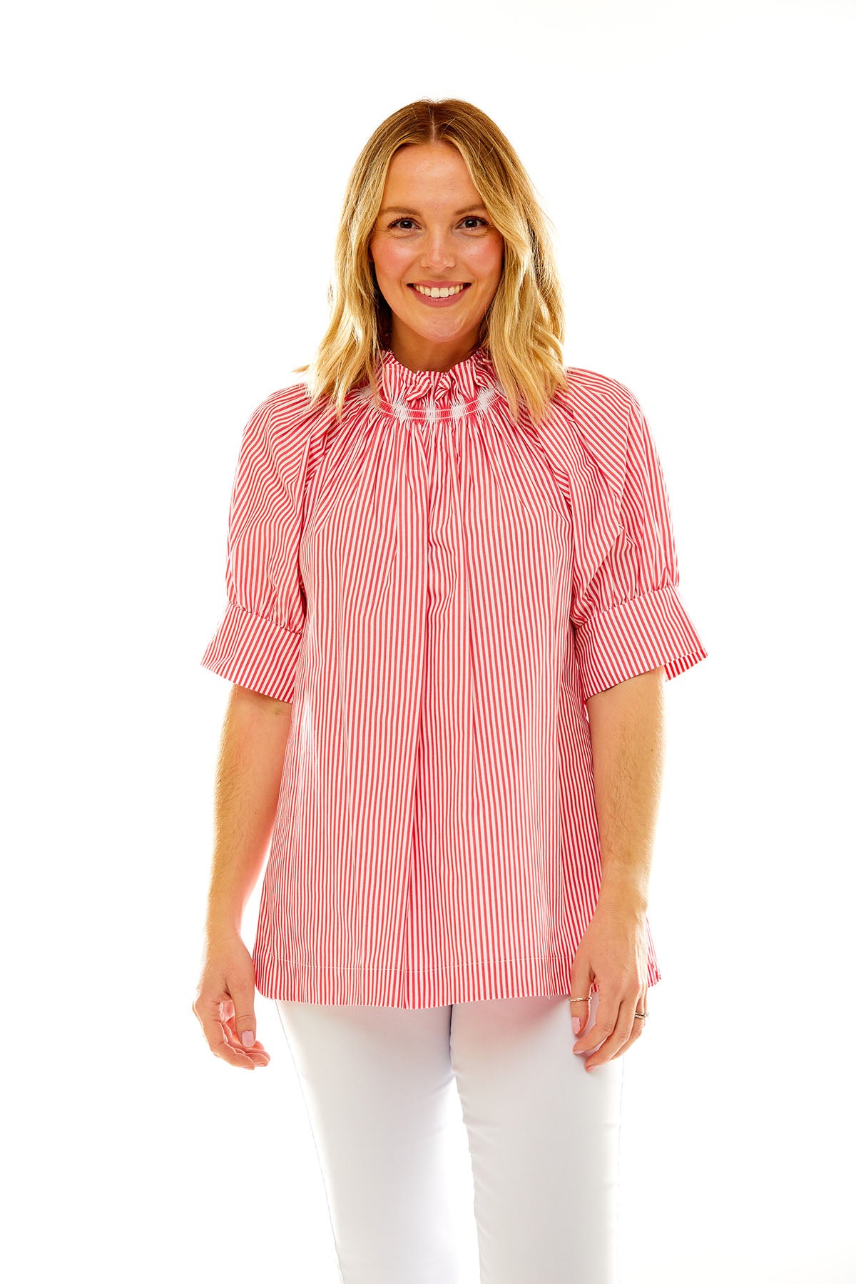 Woman in pink stripe blouse
