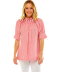 Woman in pink stripe blouse