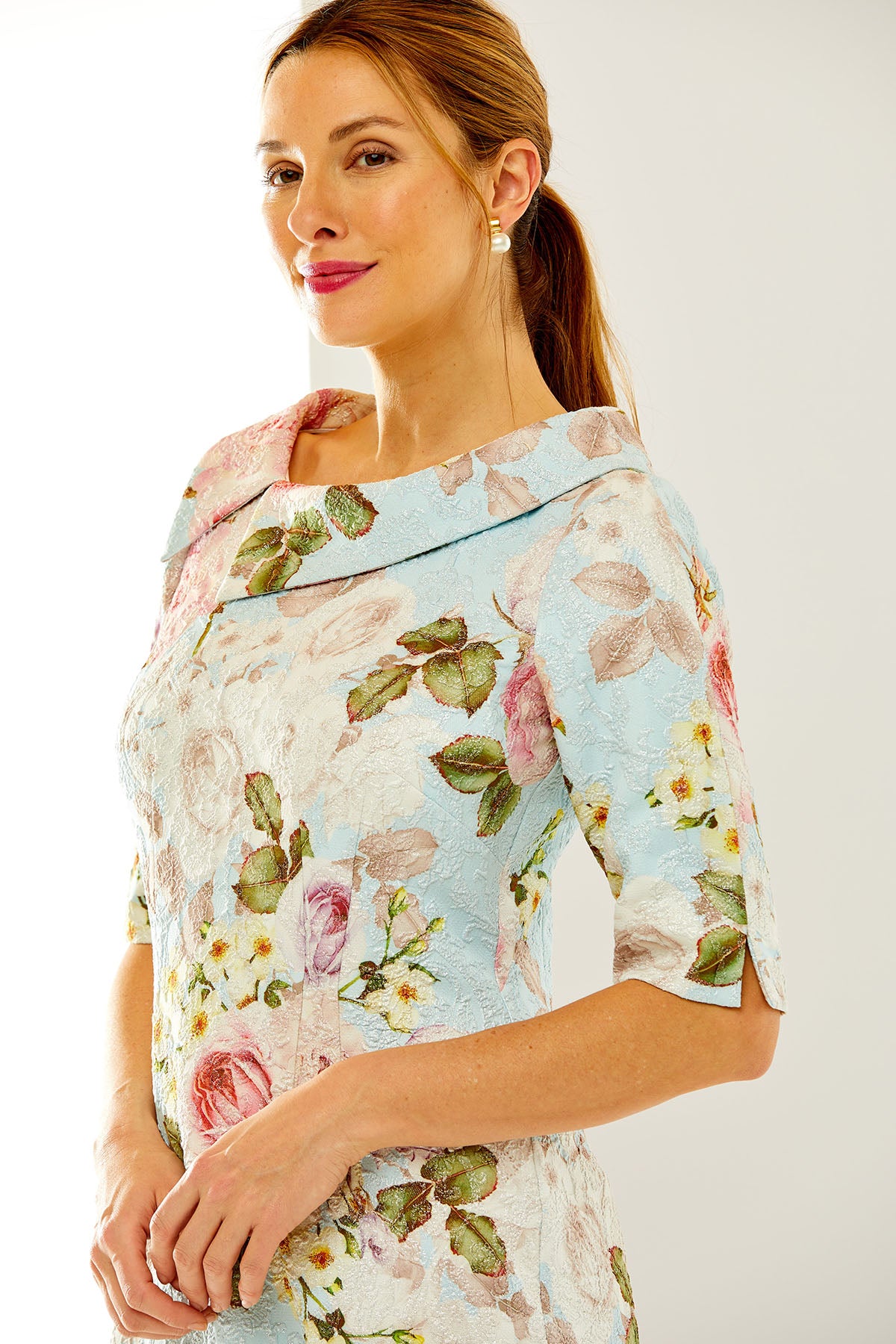 Woman in a floral sheath dress