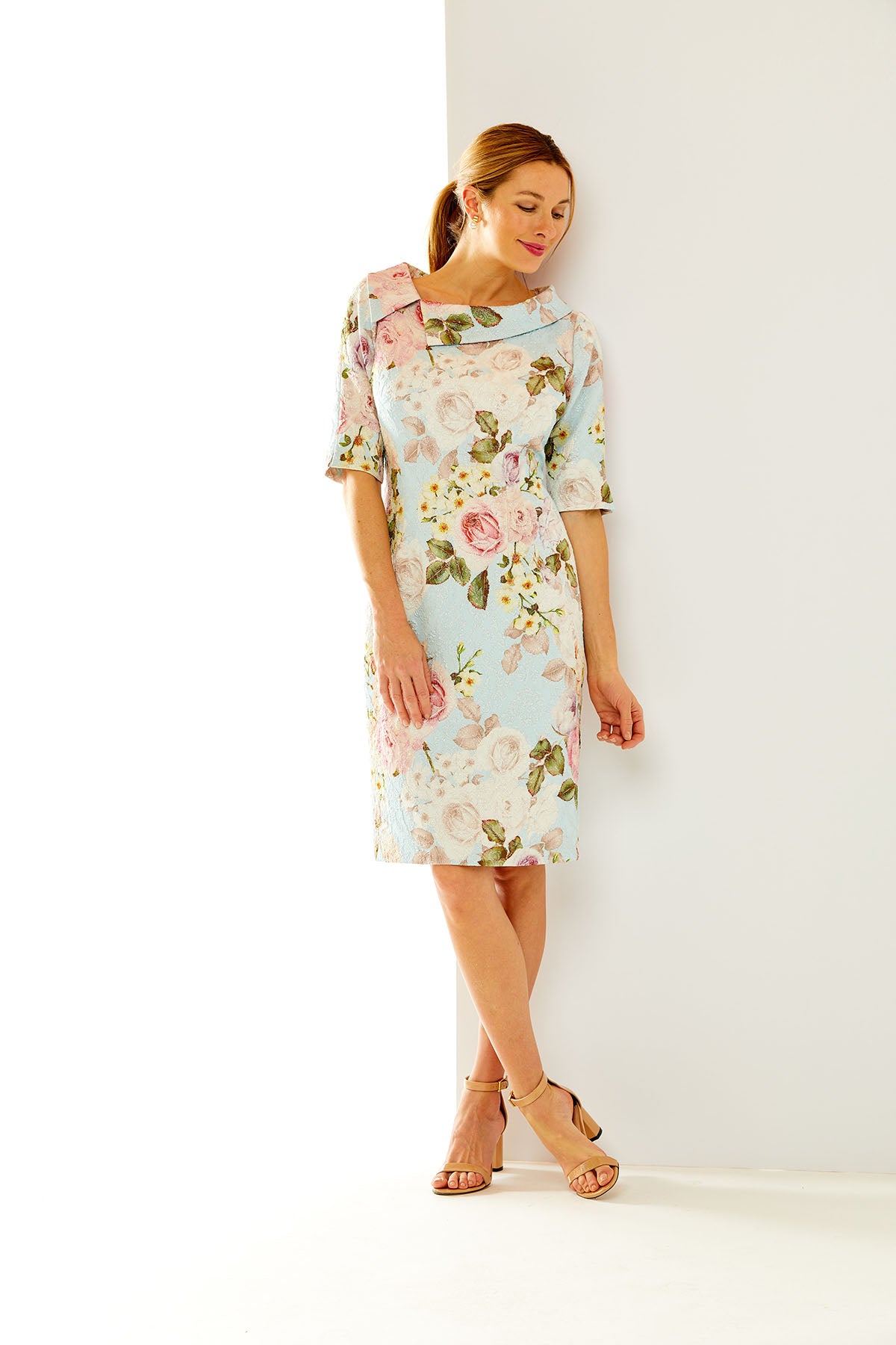 Woman in a floral sheath dress