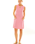 Woman in pink gingham dress