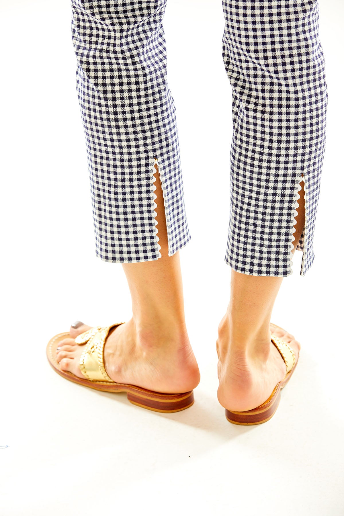 Woman in gingham slim fitting pants
