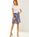 Woman in a blue floral A line skirt
