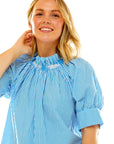 Woman in blue stripe blouse